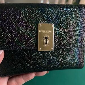 henri bendel black iridescent clutch with gold lock detail